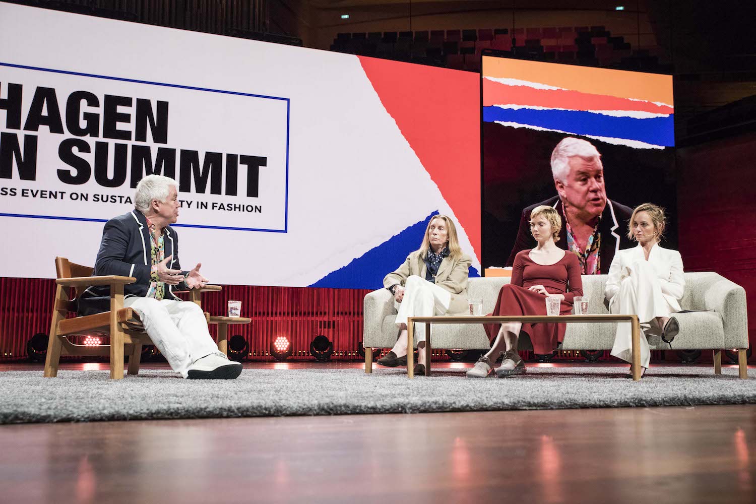 Tim Blanks in a panel discussion at the Copenhagen Fashion Summit with Tonne Goodman, Lily Cole and Amber Valletta on how brands and media houses should go about communicating sustainability
